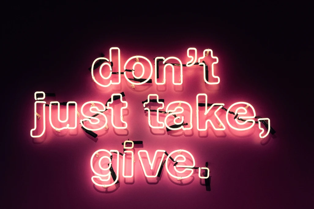 Sign saying don't just take, give